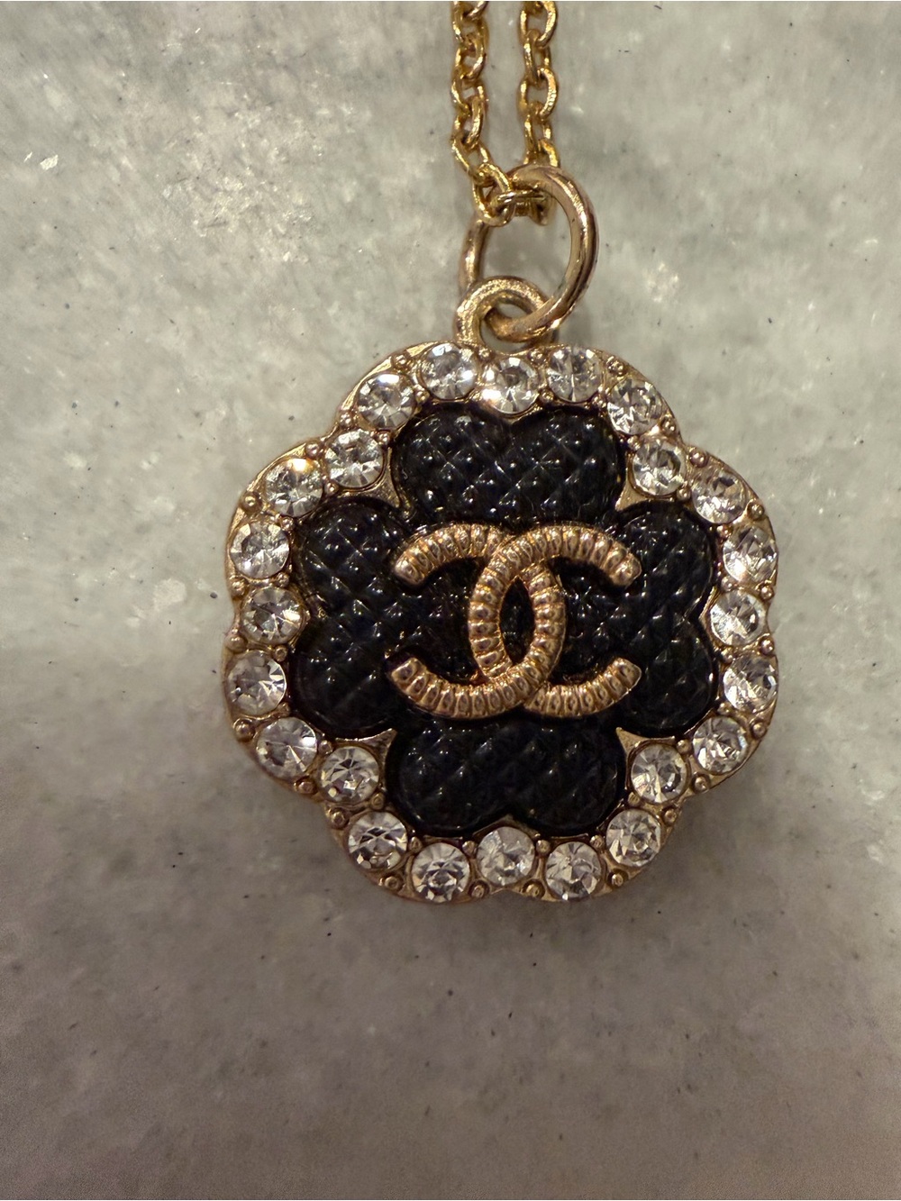 Chanel Black and Gold Clover Zipper Pull